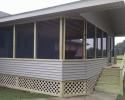 We built this new closed-in patio including installing the siding, roof and steps!